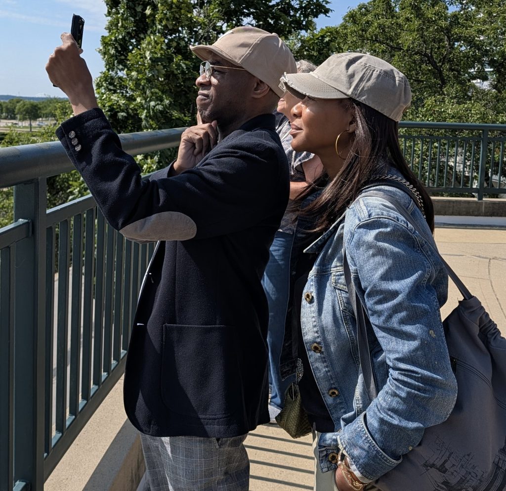 Stephen Wiltshire observing the Milwaukee skyline before drawing it from memory