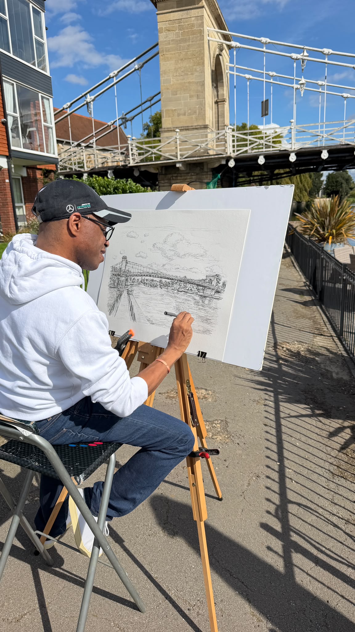 Stephen Wiltshire working on his pen and ink drawing of Marlow Bridge